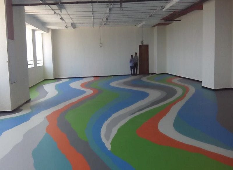 Unique swirling metallic epoxy floor finish
