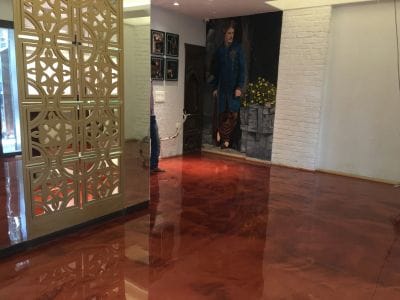 A swirl of metallic colors coats a high-gloss epoxy floor in Pune, India.
