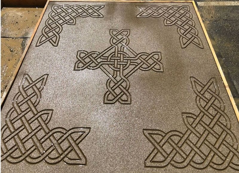 Decorative concrete project using a designer stencil