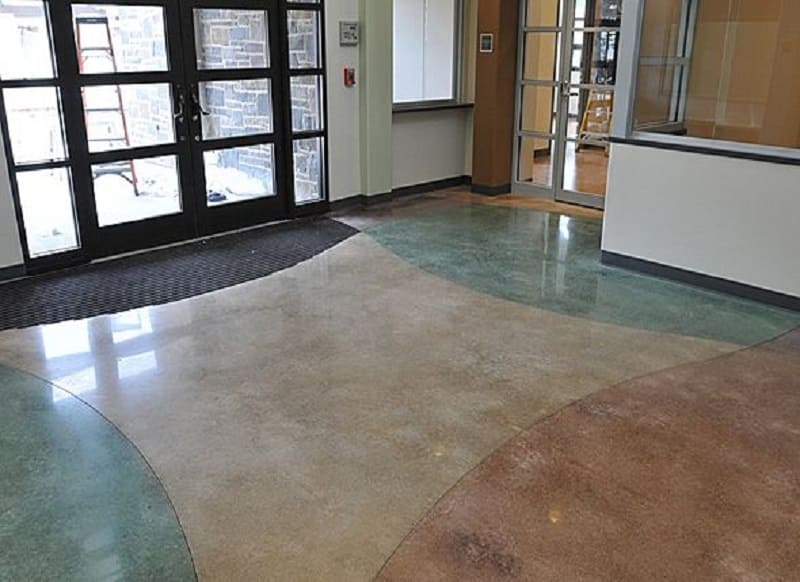 Integrally coloured concrete floor finish