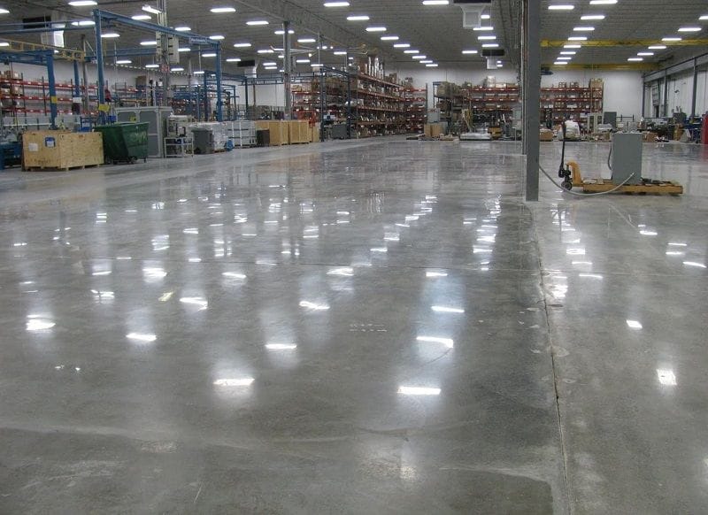 Smooth polished concrete floor reflecting light