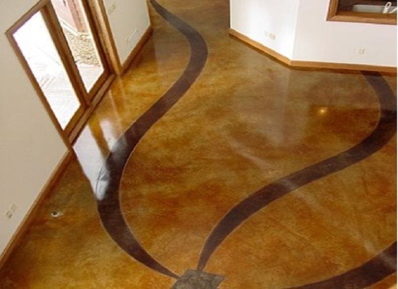 Geometric stained concrete flooring in a residential interior