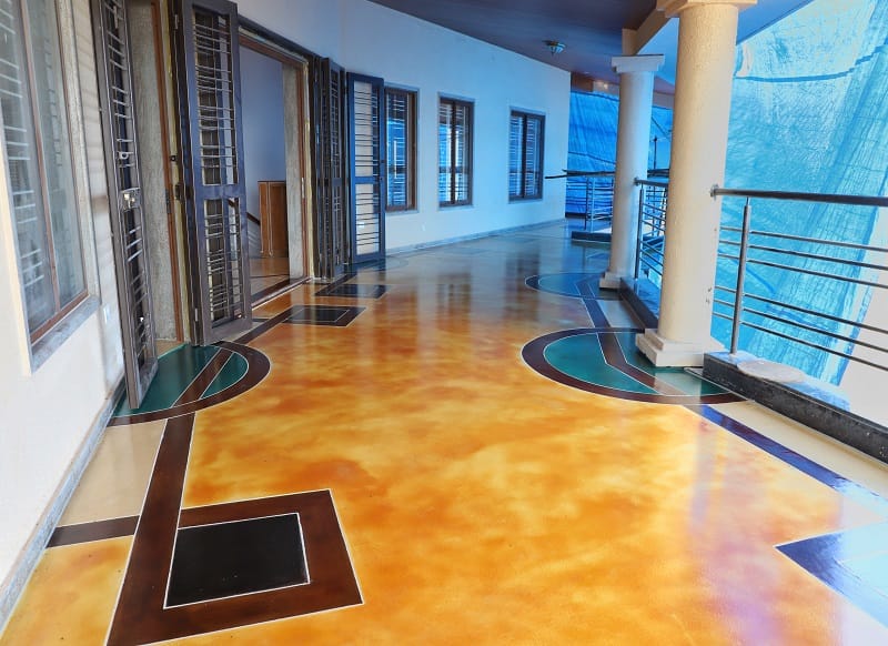 Polished stained concrete floor with earthy colours