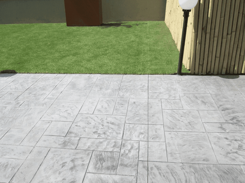 Textured stamped overlay with natural stone color variations