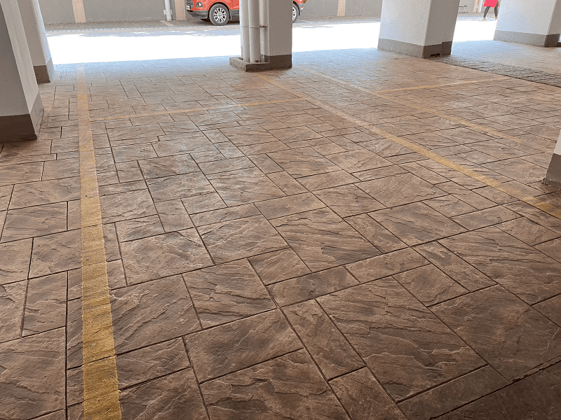 Stamped overlay decorative concrete flooring