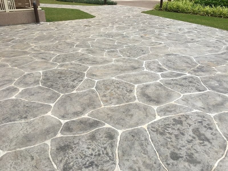 Close-up of a stamped concrete overlay resembling natural stone