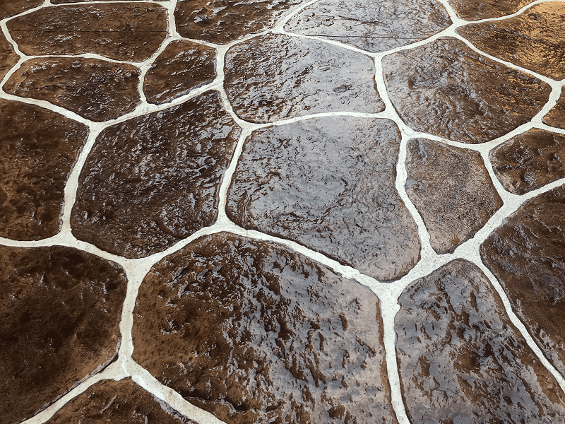 Stamped concrete surface with a natural stone pattern
