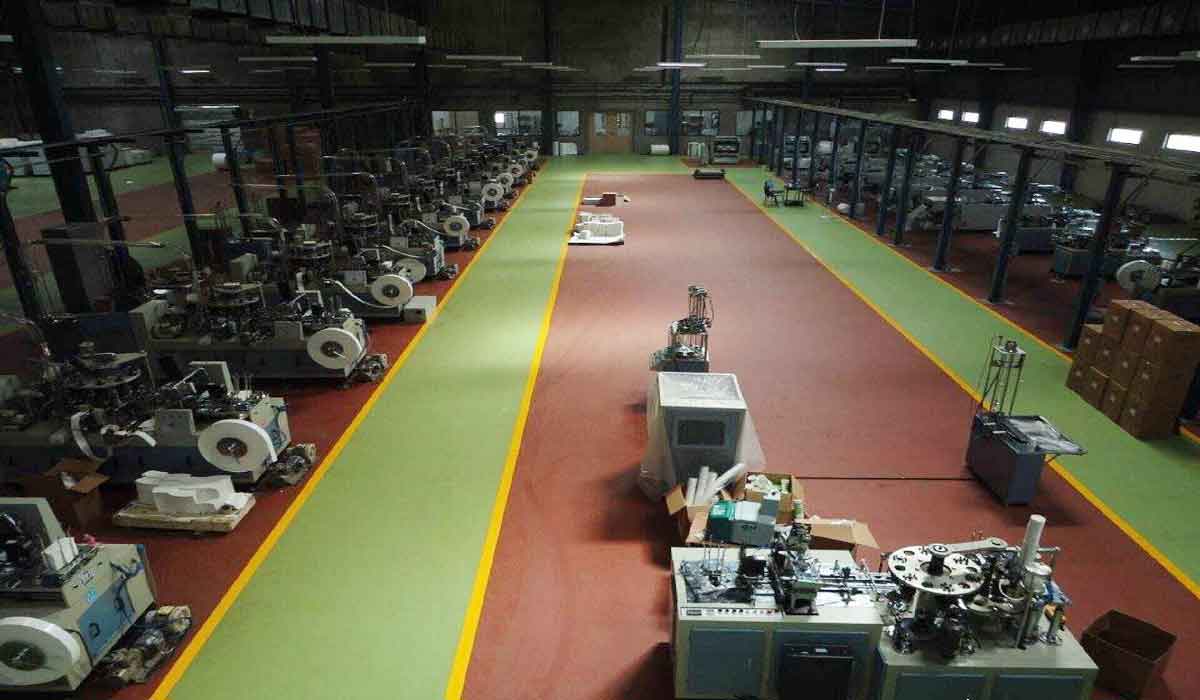 Epoxy flooring system installation in Pune, India.