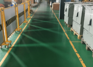 Durable epoxy floor coating being applied in a Pune, India warehouse